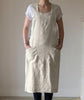 lifestyle| ecru cross back apron  - The Linen Works
